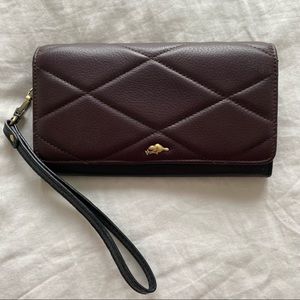 ROOTS BLACK & BROWN LARGE LEATHER WRISLET